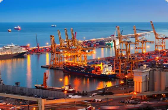 Container port lit up at dusk