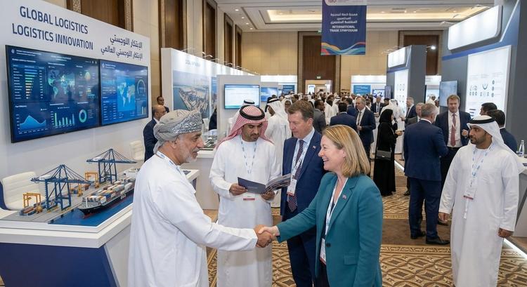 Delegates shaking hands at an exhibition
