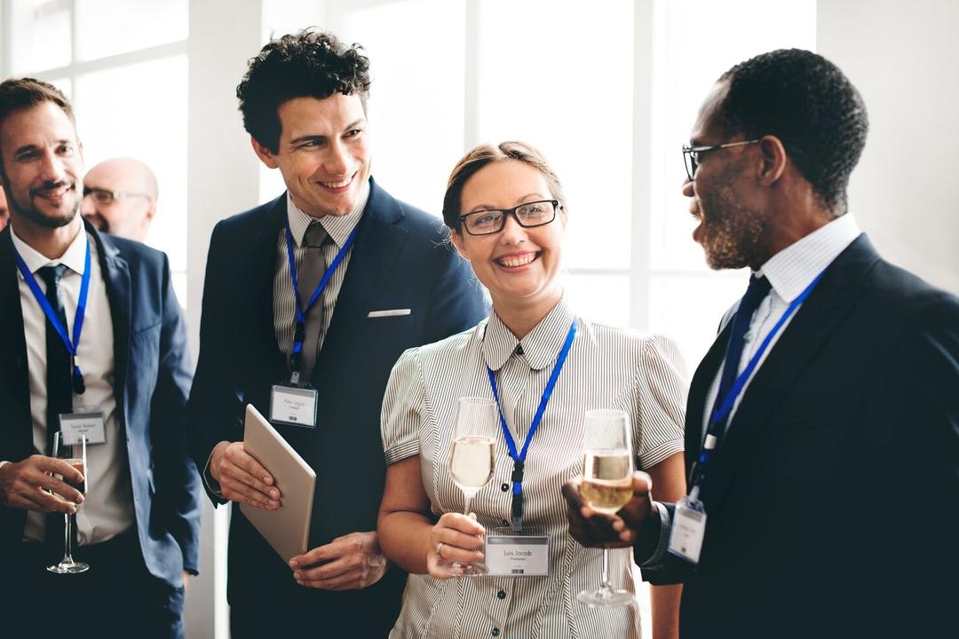 Delegates networking at an event